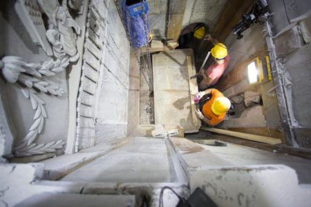 Workers begin removing the worn marble that has encased the original burial shelf for centuries, exposing a layer of fill material below. PHOTOGRAPH BY DUSAN VRANIC, AP FOR NATIONAL GEOGRAPHIC