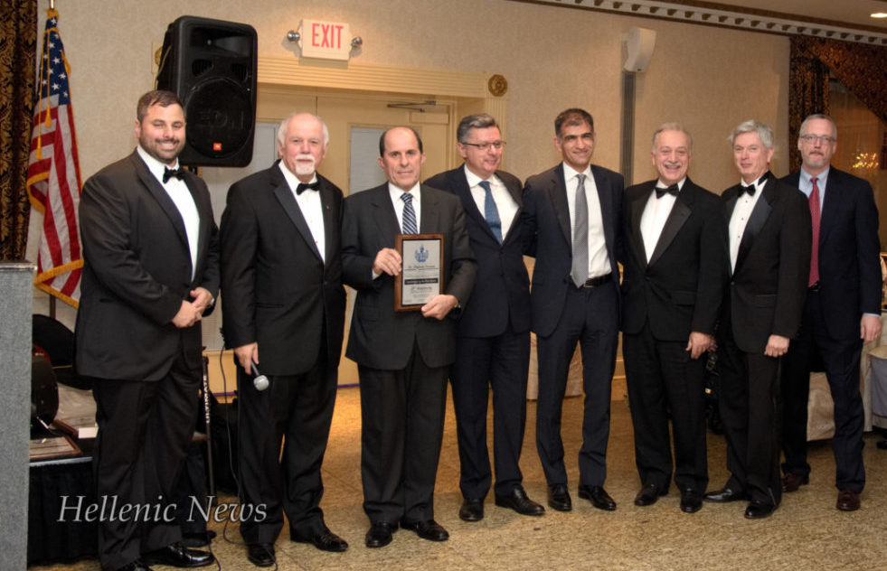 Dr. Stefanos Foussas, President of the Cardiological Society of Athens, Greece receiving his award from all the Cardiologists present at the event