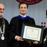 LogothetisArchbishop Demetrios and President of Hellenic College:Holy Cross, Fr. Christopher Metropulos, present Honorary Doctorate of Humanities to George Logothetis.