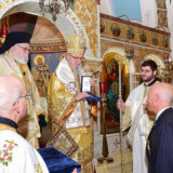 psaros michaelArchbishop Demetrios presents Michael Psaros with special gift of enamel painted small Icon of Christ at All Saints Divine Liturgy, pictured with Metropolitan Savas of Pittsburgh.