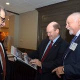 Kotrotsios proudly shows the HNA to Senator Coons of Delaware and Spiros MatzavinosIMG_7783