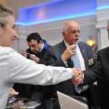 Hermes Expo Paul Kotrotsios introducing Angela from Kettle Cuisine to potential customer, Bill Kolovos