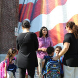 Assemblywoman Malliotakis discusses education issues last fall with constituents outside a local school