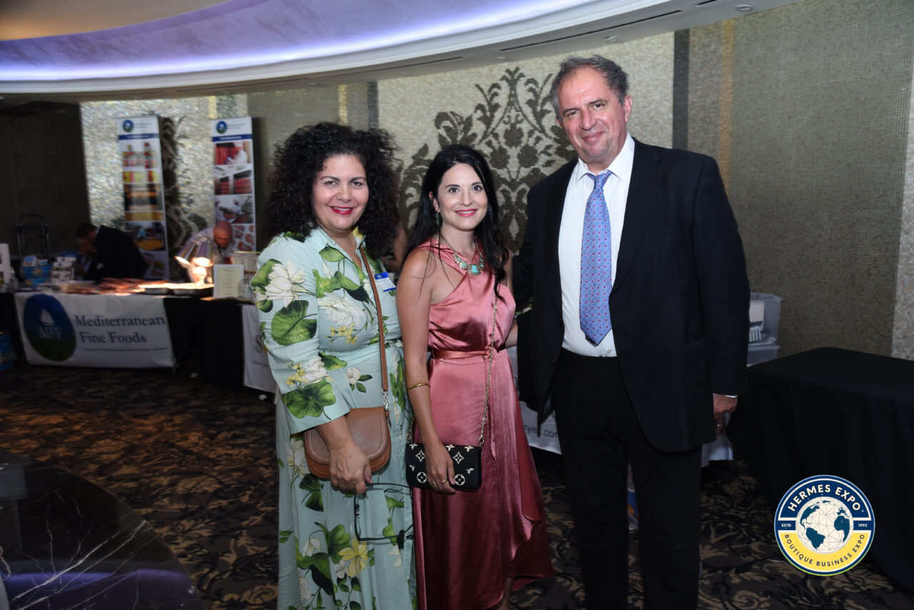 Greek-American leaders and business professionals standing together at the Hermes Expo.