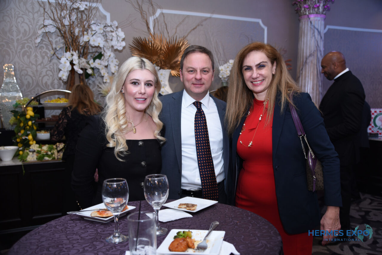 Greek-American leaders and business professionals standing together at the Hermes Expo.