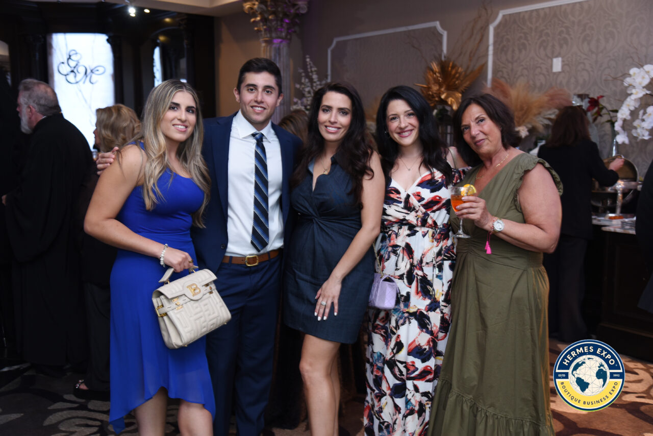 Greek-American leaders and business professionals standing together at the Hermes Expo.