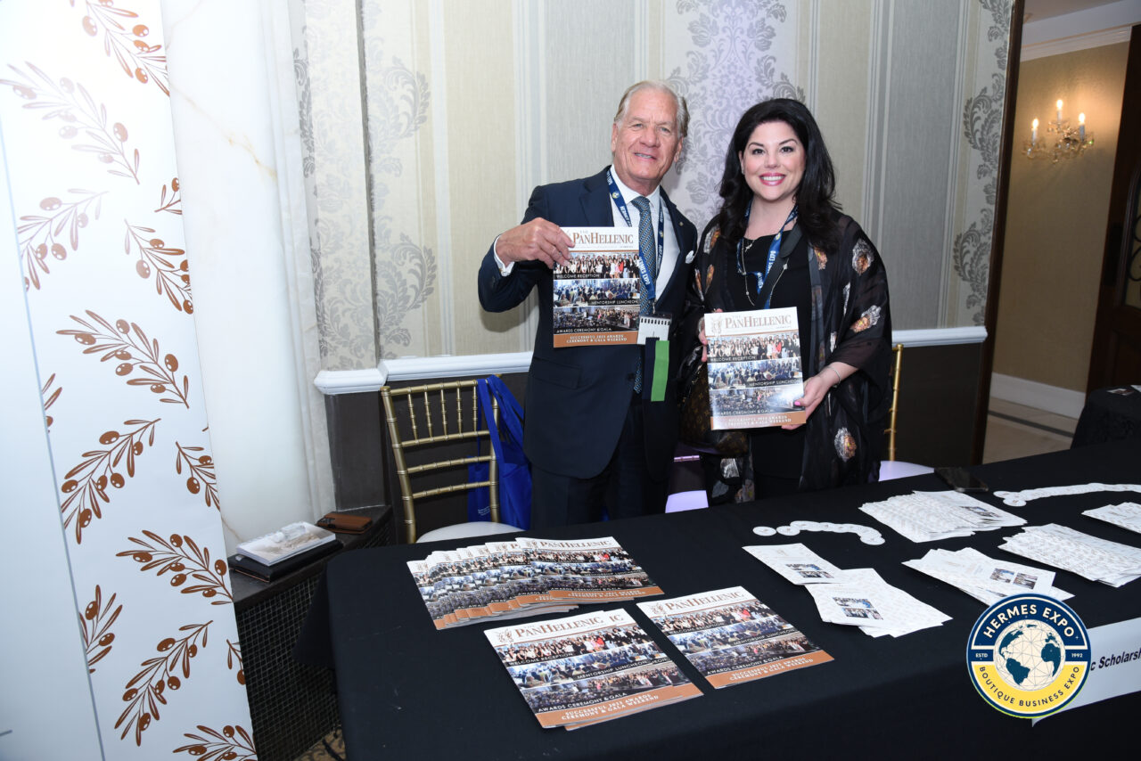 Greek-American leaders and business professionals standing together at the Hermes Expo.