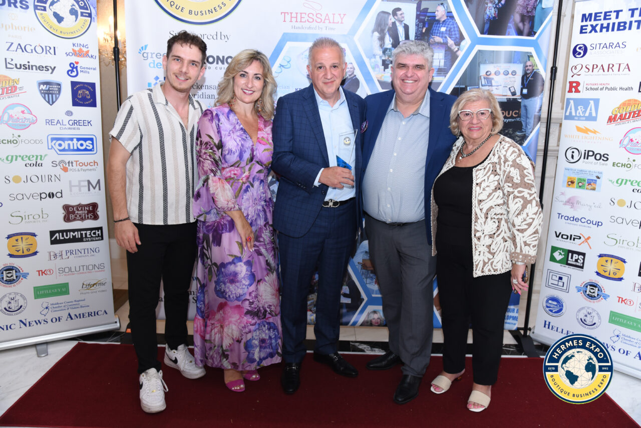 Greek-American leaders and business professionals standing together at the Hermes Expo.