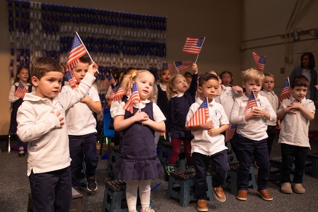 Students at Saint Sophia School in Salt Lake City perform traditional Greek dances and recite poetry during Greek Independence Day celebration.