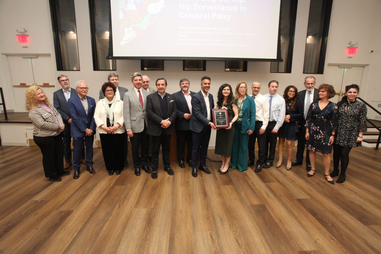 Dr. Mara Karamitopoulou receiving the Dr. Mary Kalopothakes Distinguished Female Physician Award at the ceremony in New York.