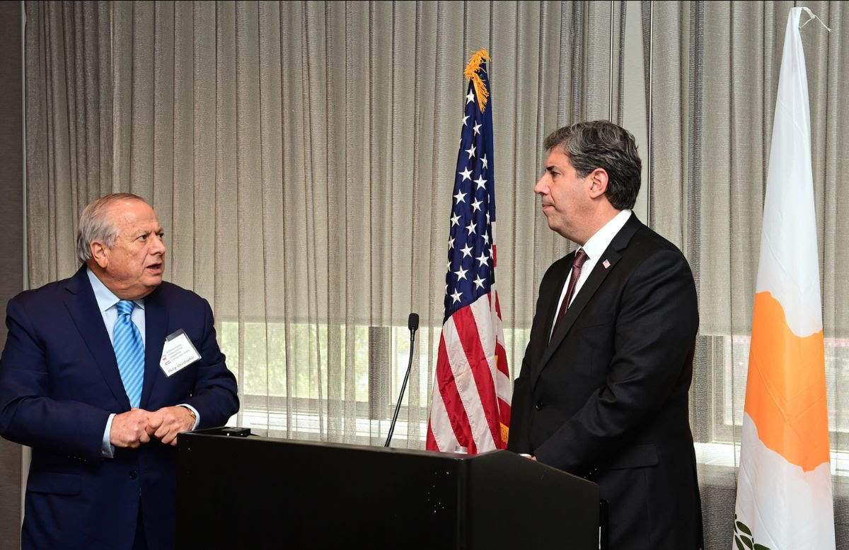 PSEKA President Philip Christopher asking Secretary Rigas about a Cyprus issue