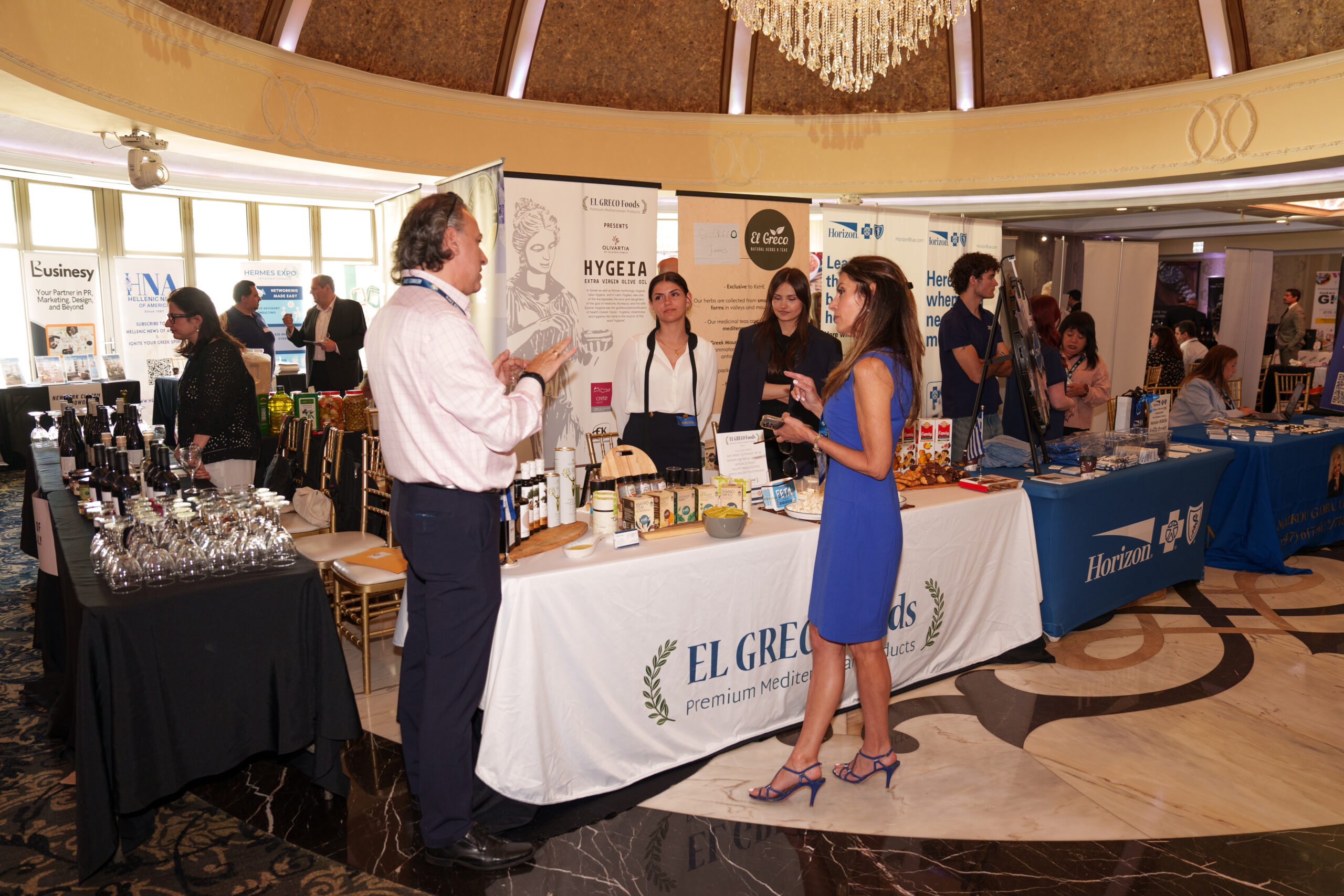 Attendees networking at the 34th Annual Hermes Expo in Old Bridge, New Jersey, celebrating Greek-American business and culture.