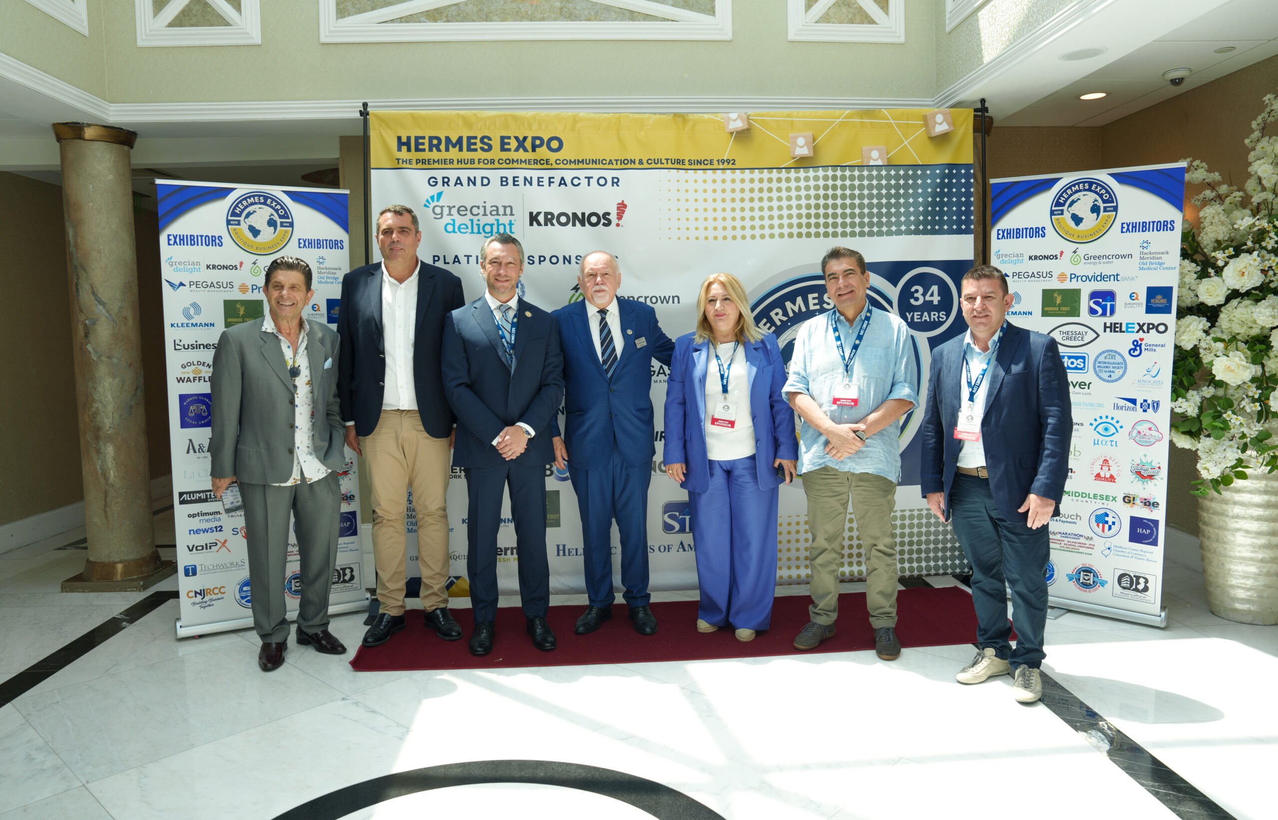 Attendees networking at the 34th Annual Hermes Expo in Old Bridge, New Jersey, celebrating Greek-American business and culture.