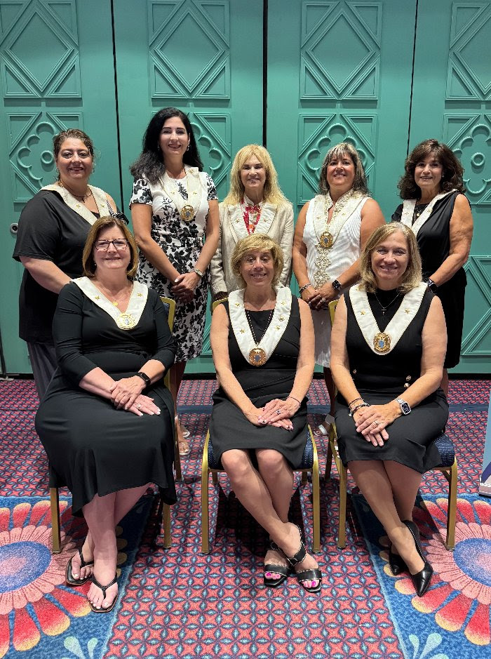 L to R Back Row: Grand Treasurer Effie Kirkiles, Grand Governor Zone I Lainie Damaskos-Christou, Grand Governor Zone II Christina Vlahopoulos, Grand Governor Zone V Roula Maginas-Koumoutsidis, and Grand Maids of Athena Advisor Helen McClure. Front Row L to R: Grand Vice President Gretchen Holtsinger, Grand President Antoinette Marousis-Zachariades, and Grand Secretary Patty Didik.