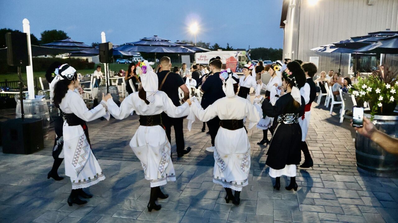 Guests dancing to live Greek music at Blue Cork Winery during Greek Night hosted by the Hellenic Federation of NJ and Pan Macedonian Youth