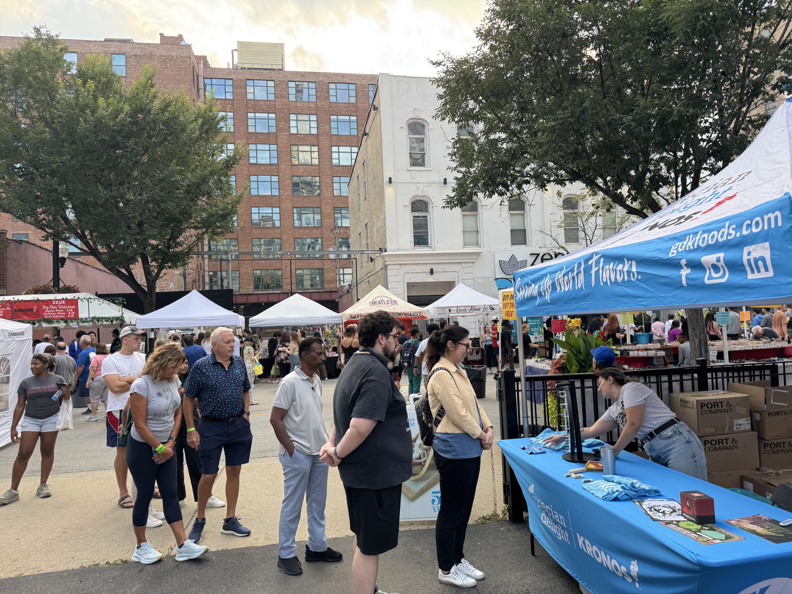 Crowds enjoying Taste of Greektown 2025 on Halsted Street, sponsored by Grecian Delight | Kronos.