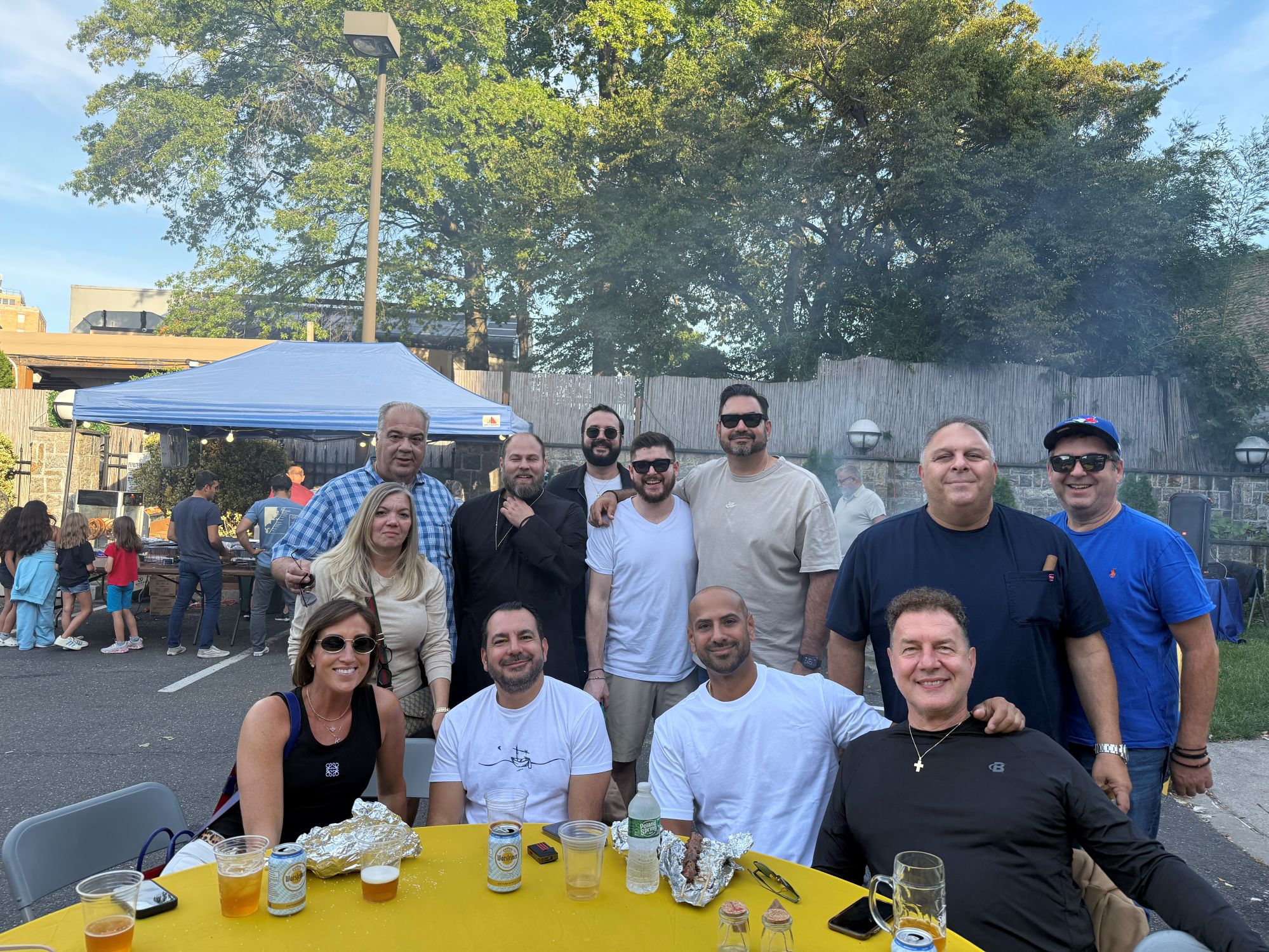 Church volunteers with Father Garinis