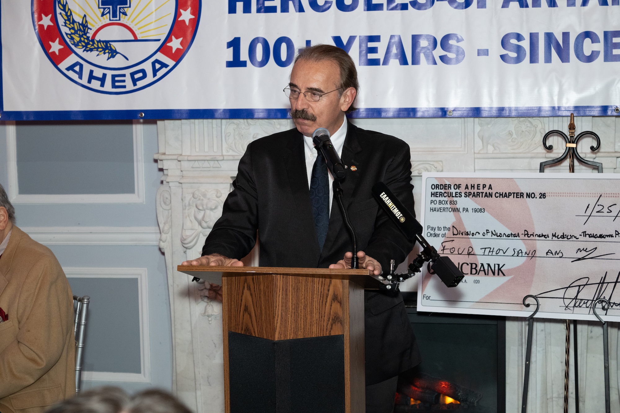 Supreme President Chris Kaitson addressing attendees at the AHEPA Chapter 26 100th Anniversary Dinner.
