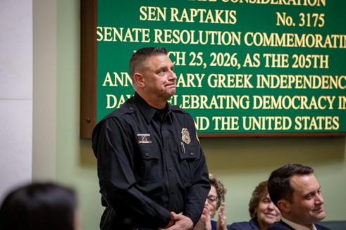 Johnston Police Officer Charles Psilopoulos being honored in the Senate chamber.