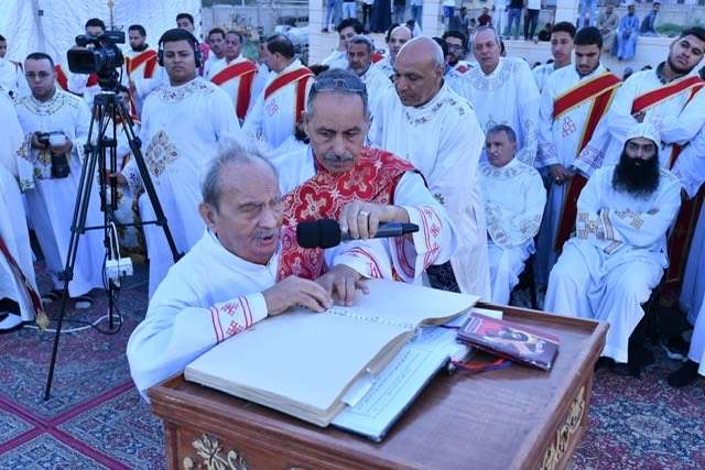 A blind deacon chants the Gospel during the Divine Liturgy. Photo courtesy of Coptic Orthodox Church