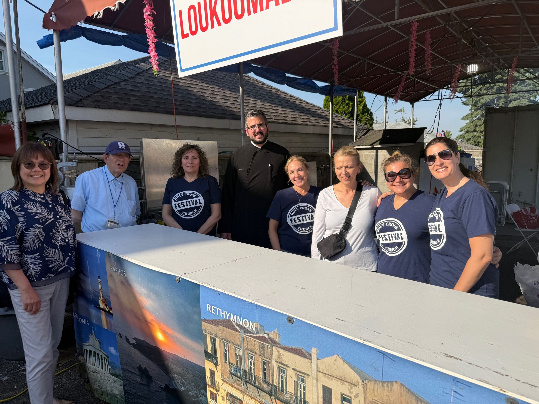 Rev. Paros (3rd from left) with Loucoumaeds chefs and Festival visitors