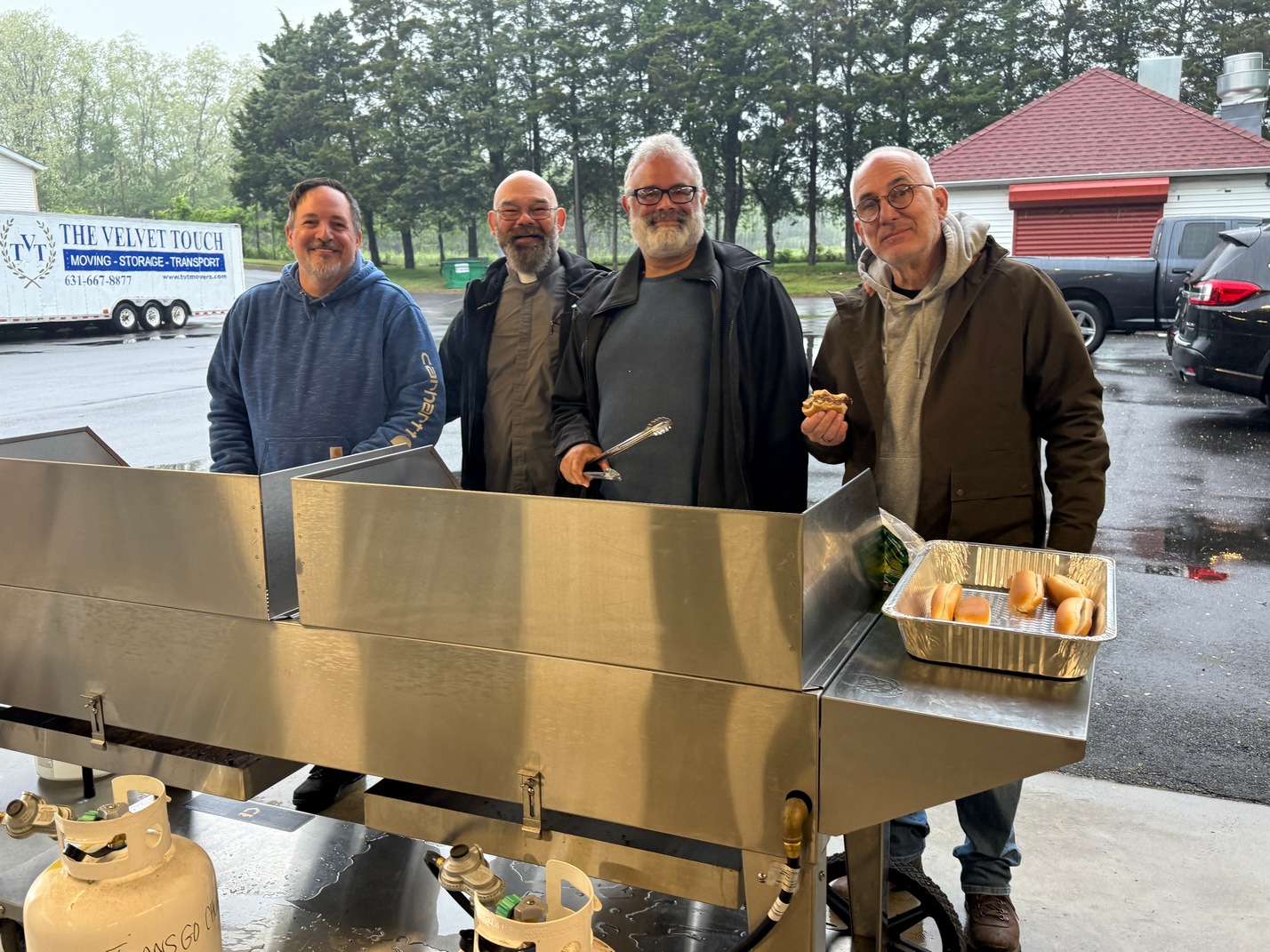 Father Andrew with chefs of event