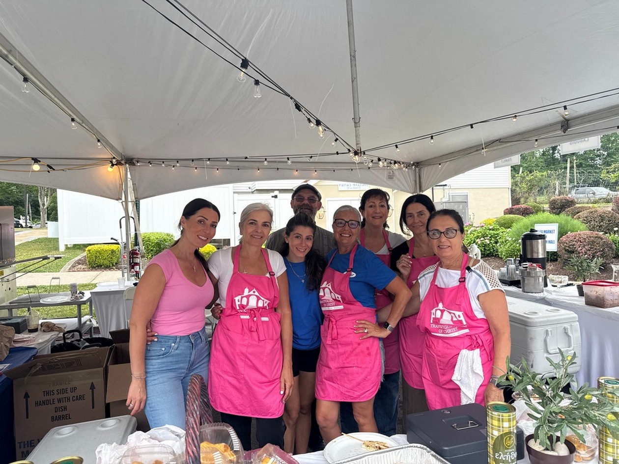 Volunteers with Father Andrew