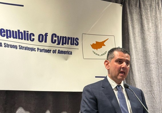 Minister Michael Damianos addresses the group