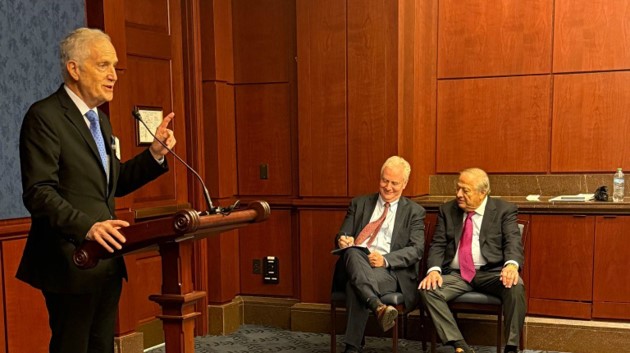 Sen. Van Hollen, seated next to Philip Christopher, is introduced by Andy Manatos